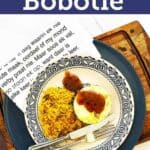 Bobotie with yellow rice, chutney drizzle, Afrikaans napkin and cutlery