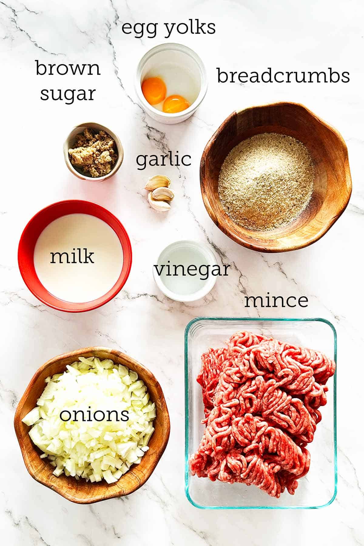 Cape Malay bobotie base ingredients including mince, onion, garlic, breadcrumbs, milk, vinegar, sugar and egg yolk