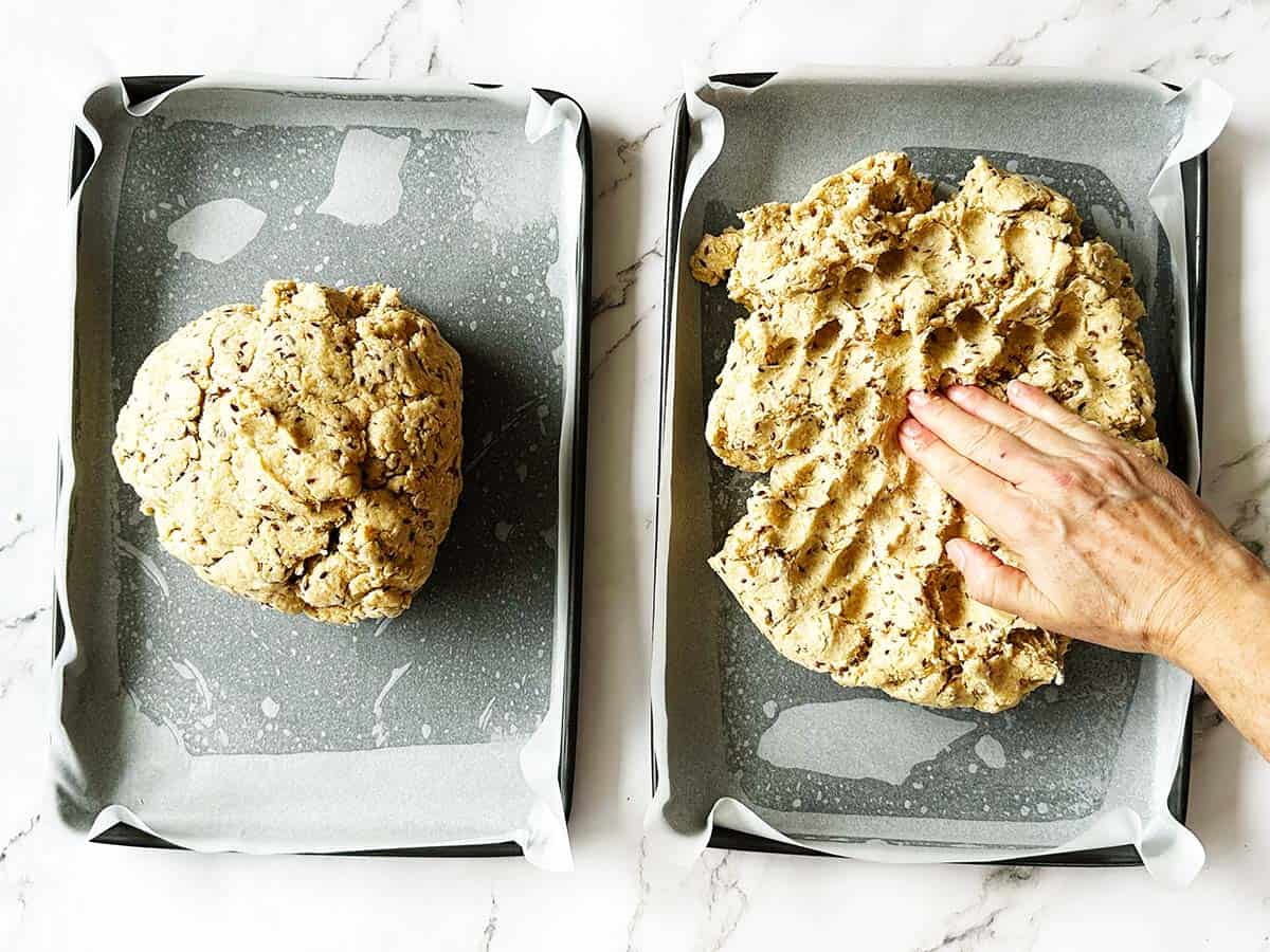 Pressing dough into pan for easy health rusk recipe
