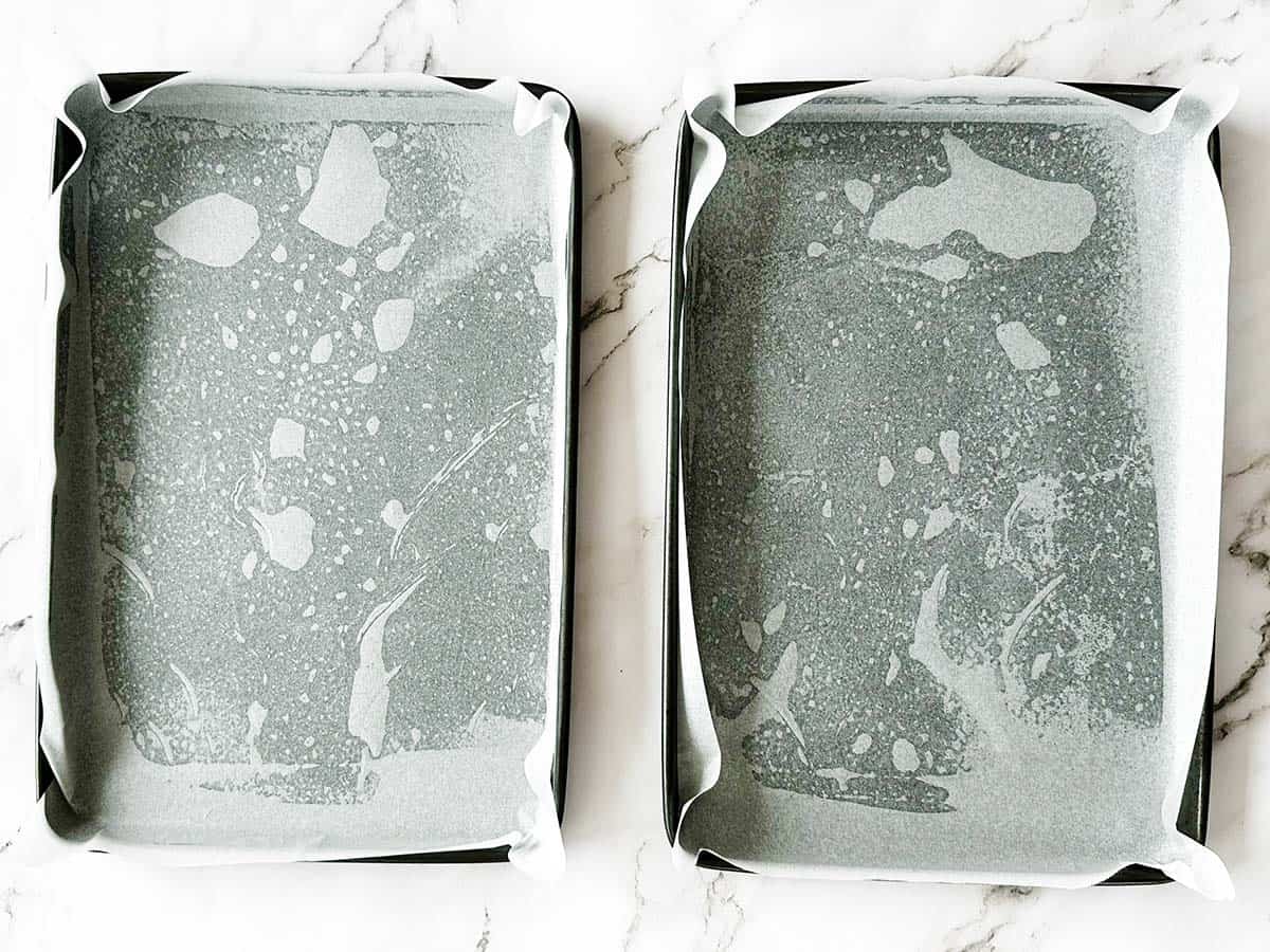 Swiss roll pans lined with baking paper for health rusk recipe