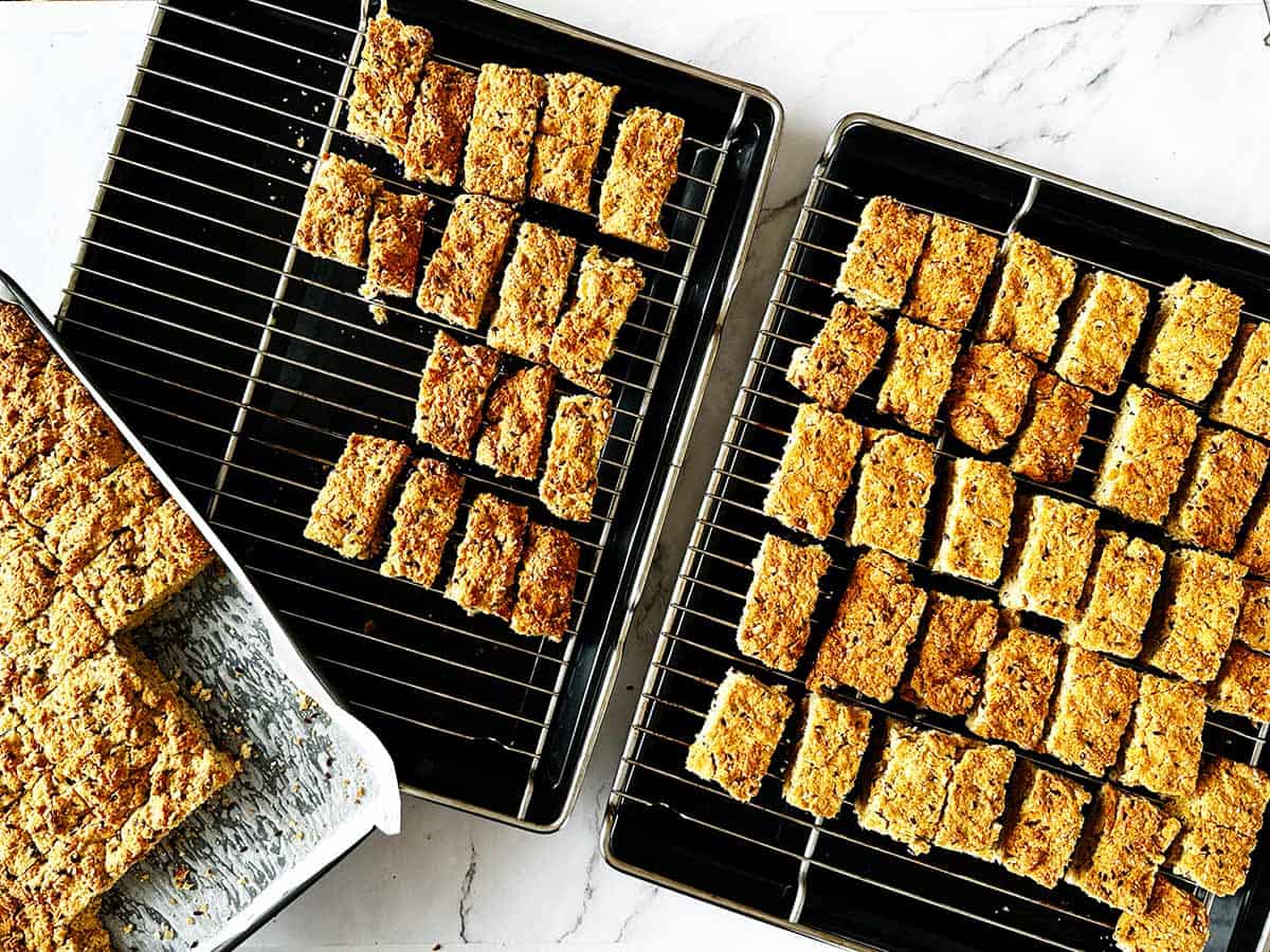 Cut rusks arranged on oven rack for drying semelbeskuit