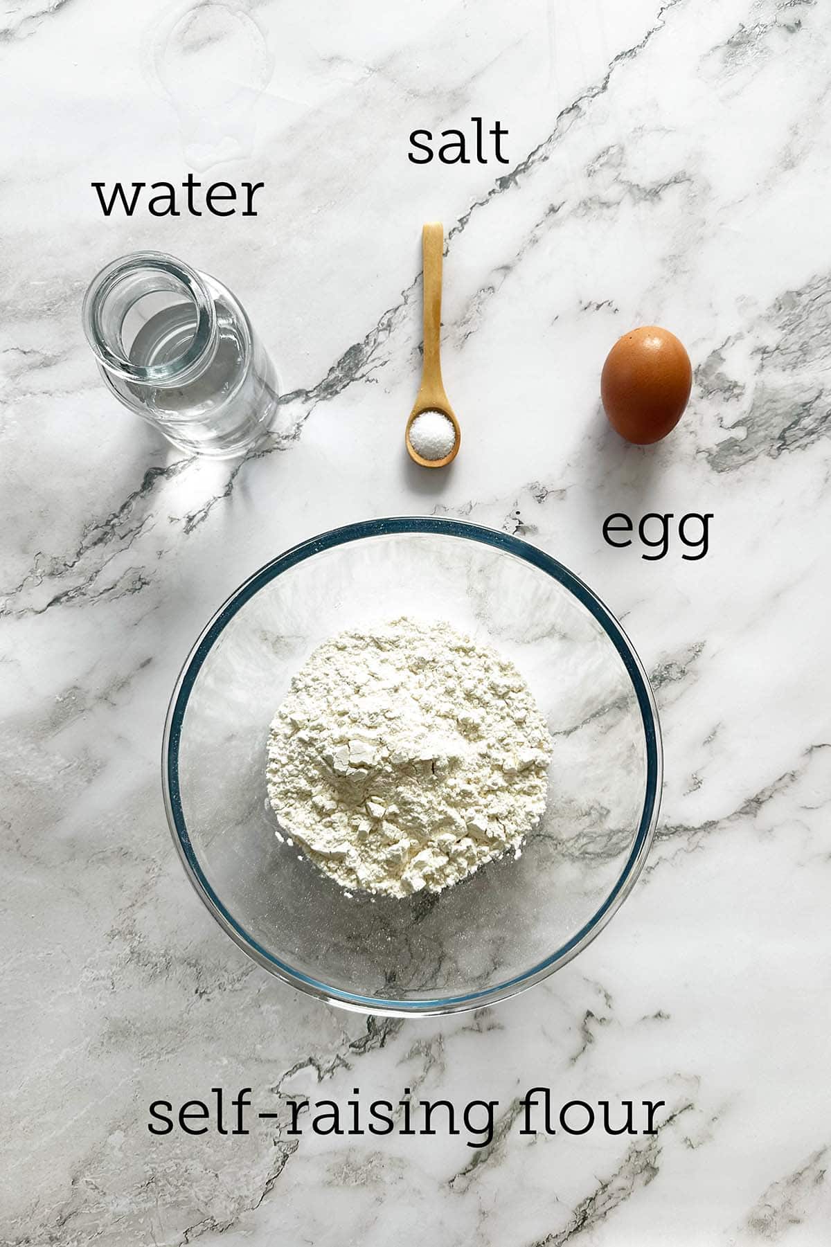 all the ingredients for vetkoek measured on bench top