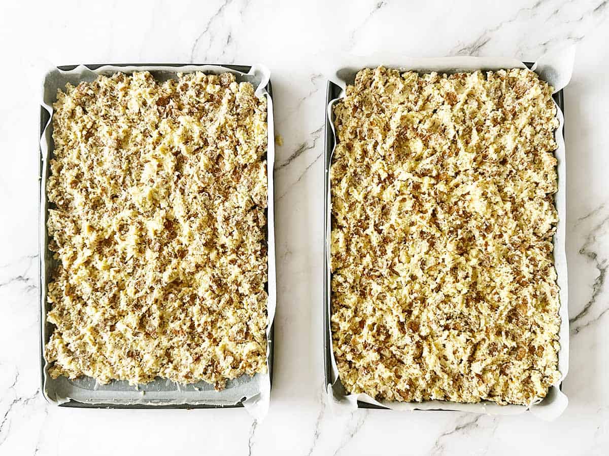 All bran rusk dough spread evenly into a Swiss roll pan ready to bake